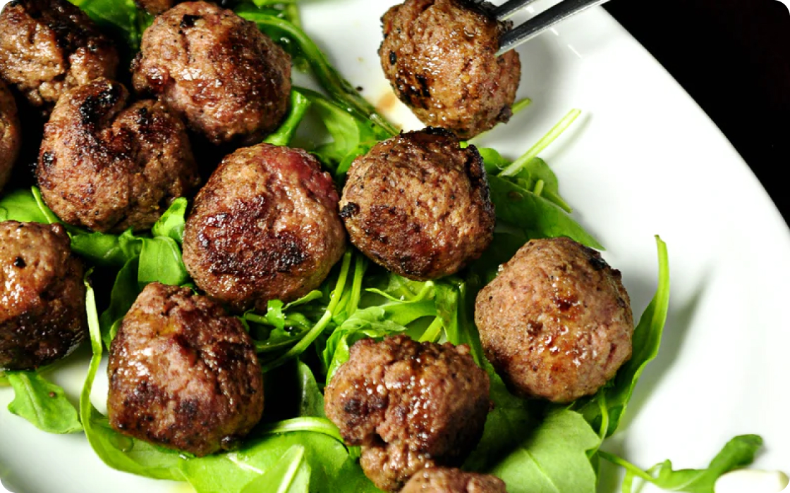 Meatballs on a bed of rocket